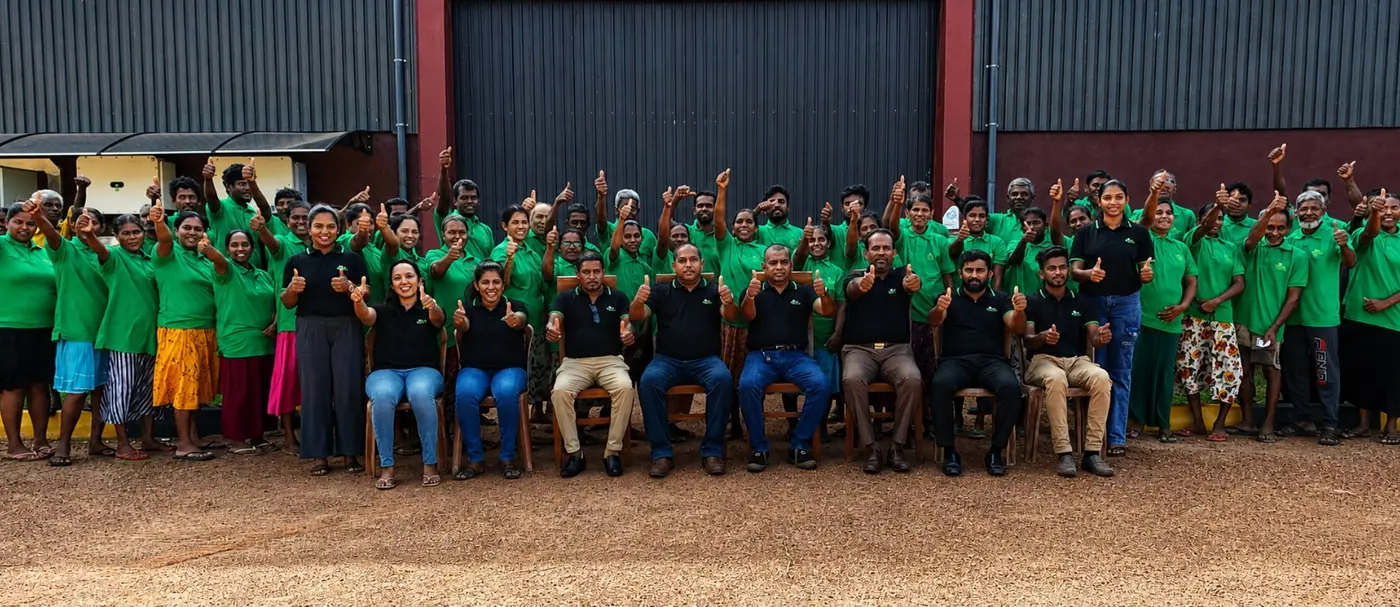 The Go Green Exports workforce photographed together outside the Bingiriya factory building